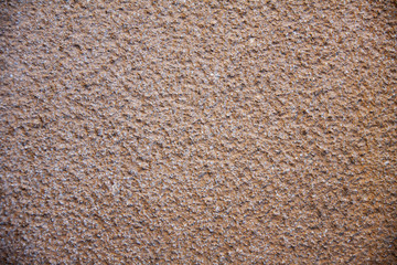 Beige cement plaster wall 