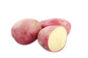 heap of red  potatos isolated on white background