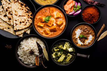 Indian Lunch / Dinner main course food in group includes Paneer Butter Masala, Dal Makhani, Palak...