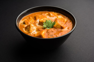 Palak Paneer Curry made up of spinach and cottage cheese served in a bowl or pan with roti or rice