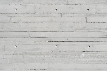 Modern light concrete wall in interior, Texture of wooden formwork stamped on raw concrete wall as background - 228283645