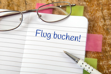 Eintrag im Kalender: Flug buchen!