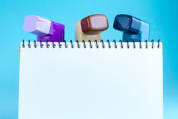 Various asthma inhalers on a blue background. Asthma and copd disease concept. Copy space