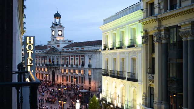 Madrid, Spain, famous "Puerta del Sol" square. Day to night Time Lapse