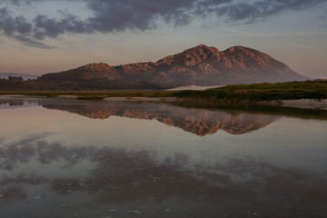 sunset and reflections in the coastal lagoon