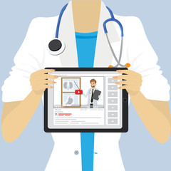 Female doctor or nurse holding medical tablet pc