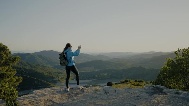 Female hiker on top of mountain