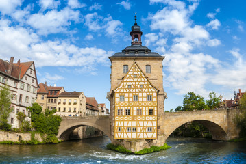 Fototapeta na wymiar Old Town Hall on the river Regnitz Bamberg on a sunny summer day.