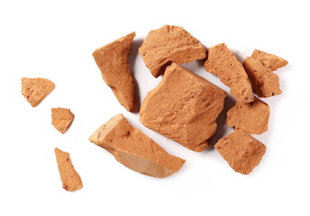 Shattered bricks isolated on white background, top view