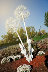 Iron dandelion in public park, concept of independence - 228292015