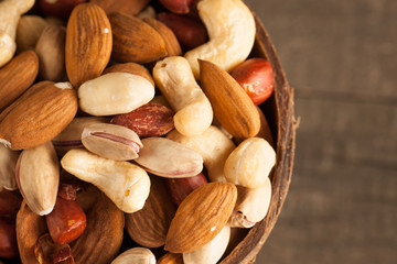 mix of nuts on a wooden table