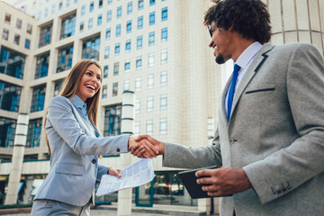 Business people handshake outdoor.