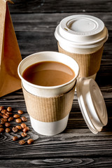 coffee cup take away at wooden background
