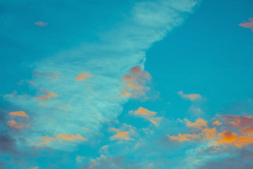 Fototapeta na wymiar blue and orange sky clouds at sunset or sunrise.