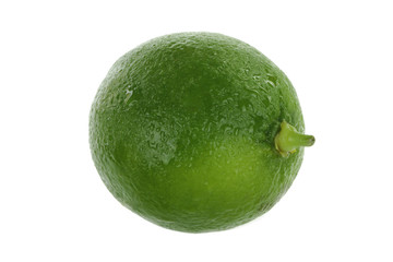 green fresh lime isolated on white