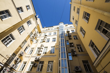 Yellow building wide angle view from down