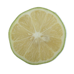 half of yellow lime isolated on white background