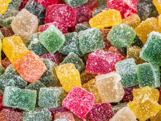 Pile of various Turkish delights. Multi-colored  square lokum. Pile of colorful Turkish delight...