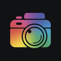 Photo camera, simple icon. Rainbow color and dark background
