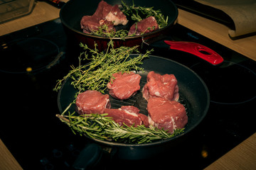 A beautiful dish on a white plate on the table in the restaurant.