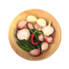 hot spices in wooden plate isolated