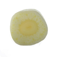 half of clove of garlic isolated on white background