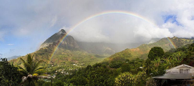 Panoramic view of Temetiu peak and rainbow, Atuona, Hiva Oa island, Marquesas Islands, French Polynesia