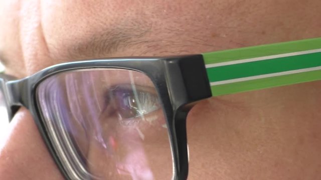 Mans eyes and glasses