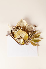 Autumn Composition Template. Golden Leaves in the postal envelope. Fall, autumn concept. Top view picture.