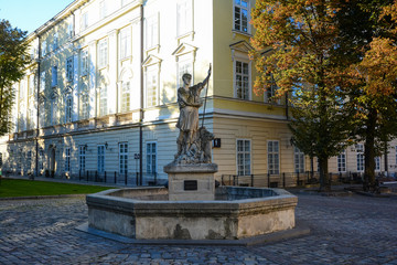Fountain with sculpture of Greek god Adonis near the Square Rynok (Market) in Lviv, Ukraine.