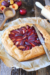 Homemade red plums tart galette, french cuisine