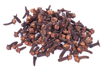 dry cloves on white background