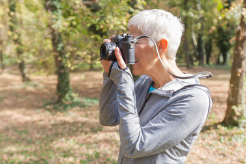  Senior Woman With Retro Camera Outdoor