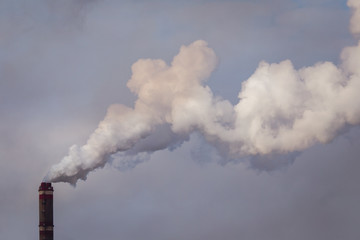 Smoke from the pipes of the factory