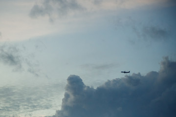 passenger plane in the clouds