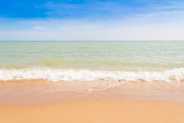 Abstract beach background. Yellow sand, blue sky and calm tropical beach landscape.Exotic nature concept.Location Satheep Thailand