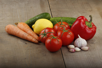 heap of vegetables on wooden background
