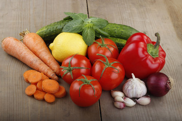 heap of vegetables on wooden background