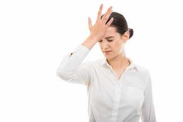 Young pretty business woman showing headache gesture