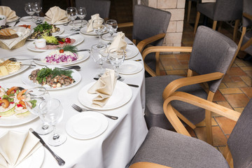 served holiday table with dishes, food on the table