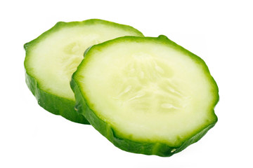 two slices of cucumber isolated on white