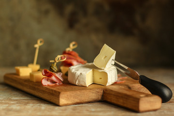 camembert cheese (cheese platter delicacies) groceries. Brie cheese top view.