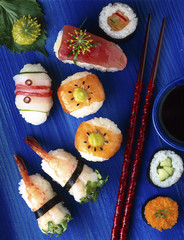 SUSHI ON BLUE WOOD