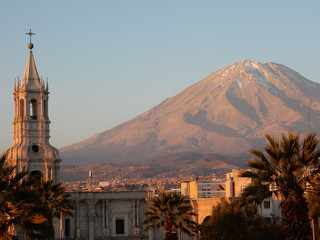 Misti volcano with Arequipa cathedral at sunset, Peru
