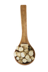 heap of fennel in wooden spoon isolated on white background