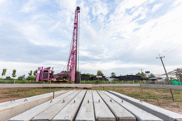 Fototapeta na wymiar Pile crane or pile driven machine set up in construction site