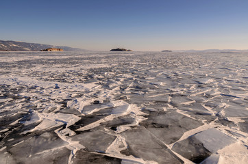 Field of ice hummocks on the frozen Lake Baikal. Russia