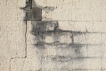 mur de parpaing fissuré
