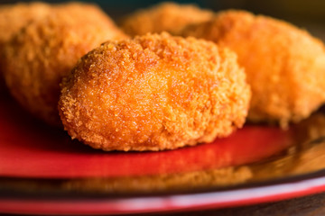 Freshly cooked breaded meat cutlets on plate