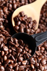 Coffee beans with a scoop